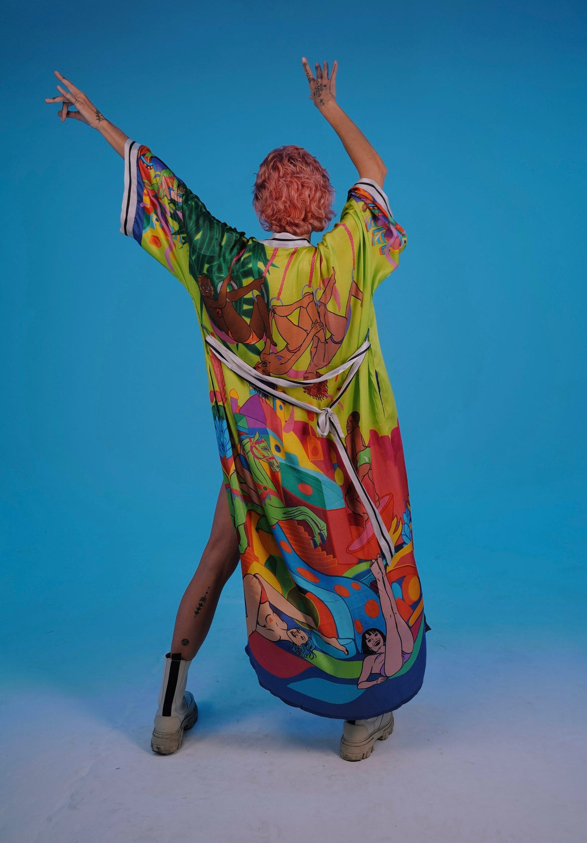 Back view of artistic kimono showing flowing fit and colorful design