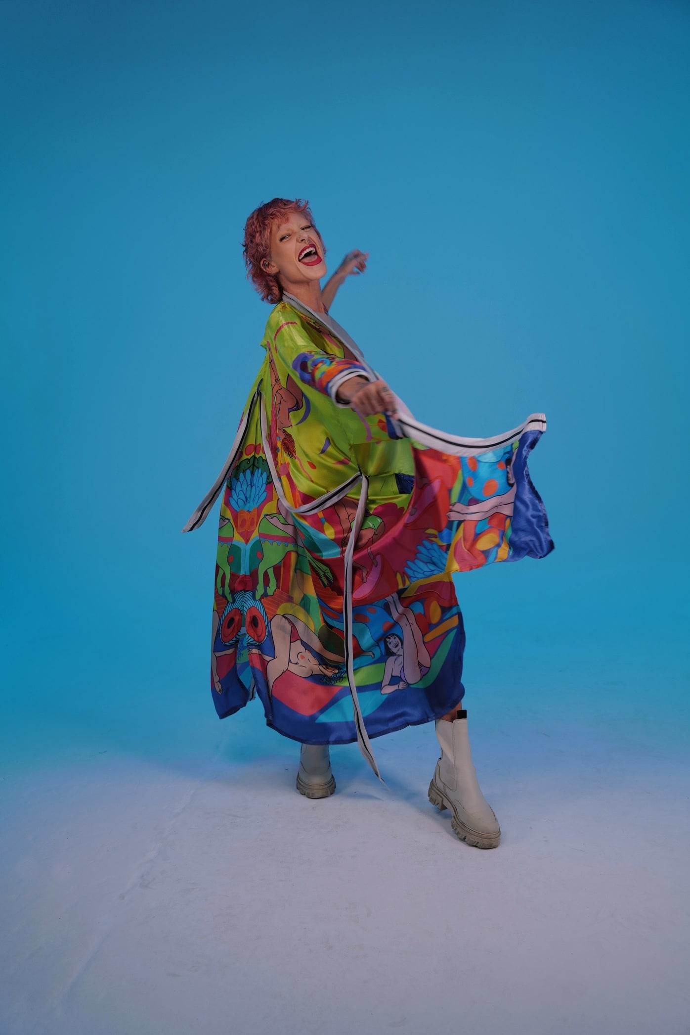 left Side view showing silhouette and functional pockets of Girls Neon Kimono