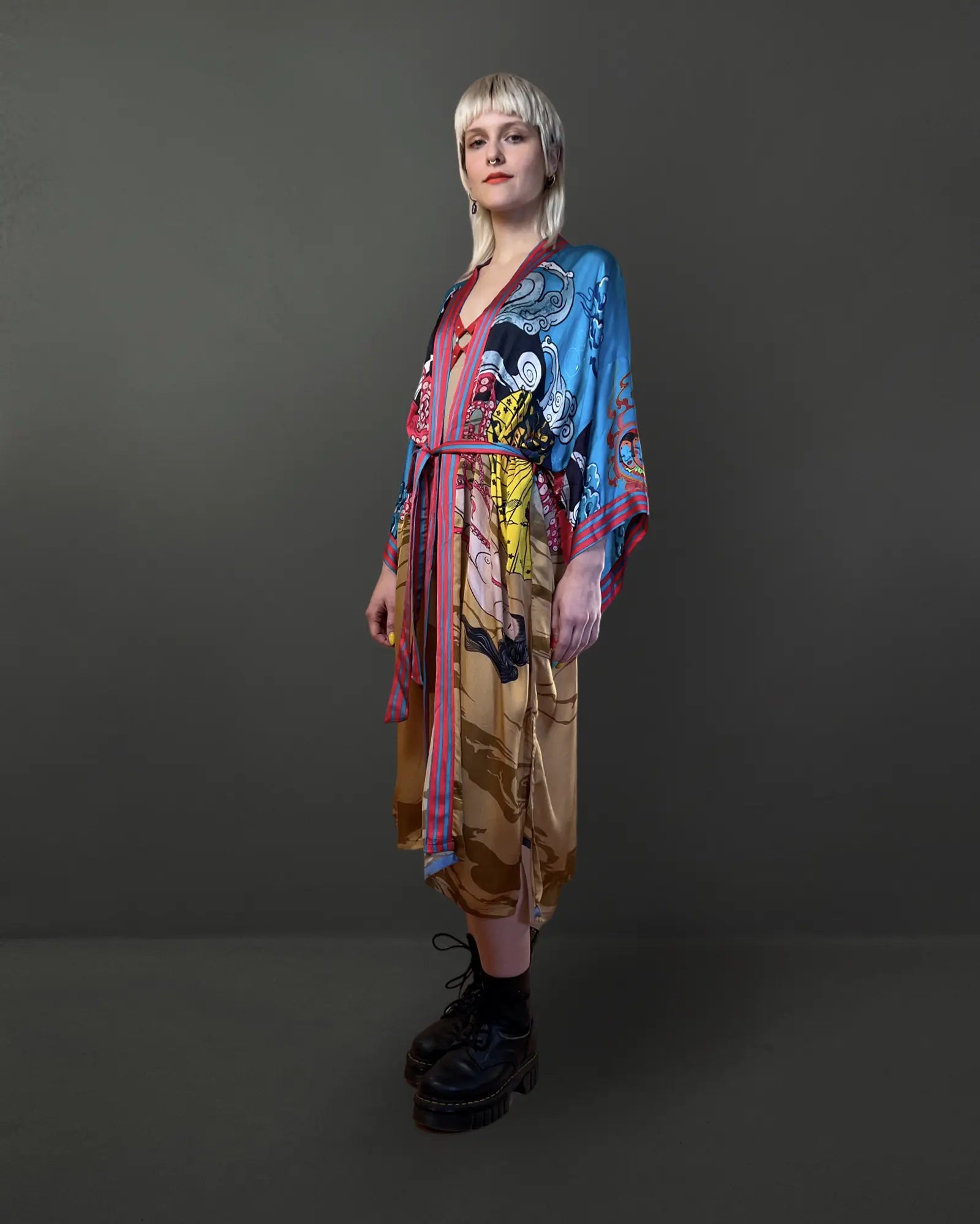 Front view of Japanese Dream golden artistic kimono with illustrated design