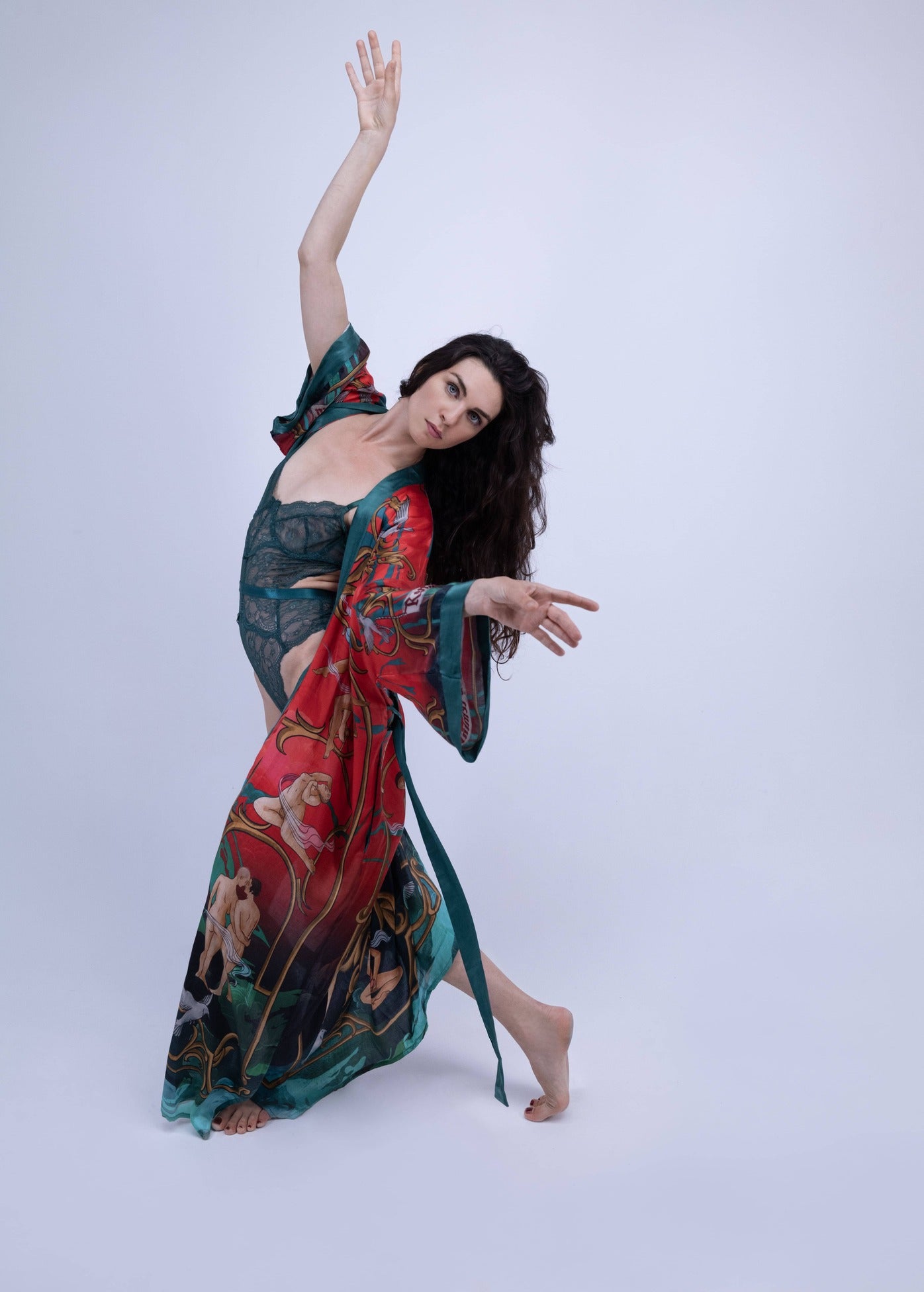 Side angle showing relaxed fit and functional pockets of the artistic kimono