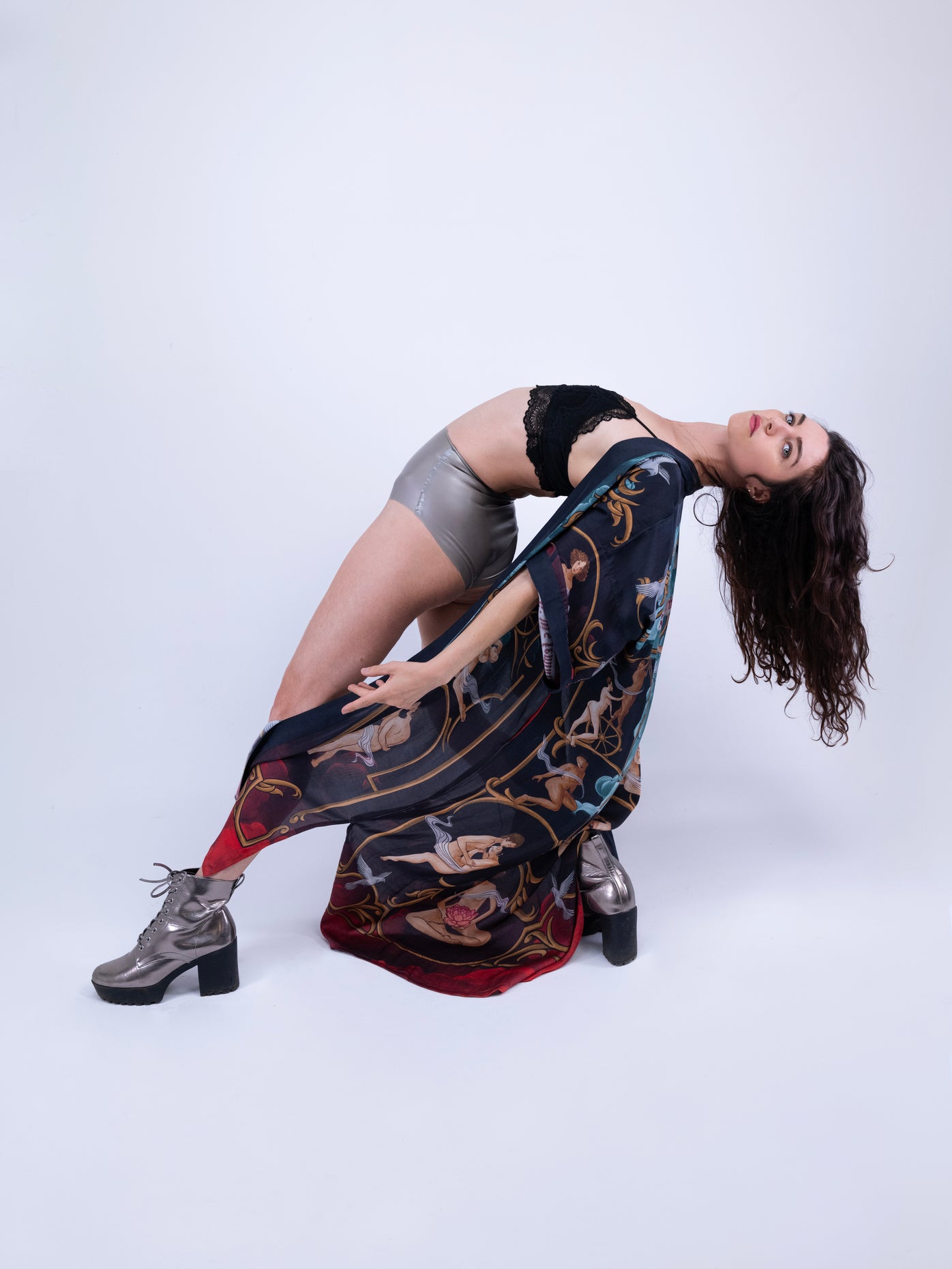 Side view showing silhouette and pockets of the artistic kimono