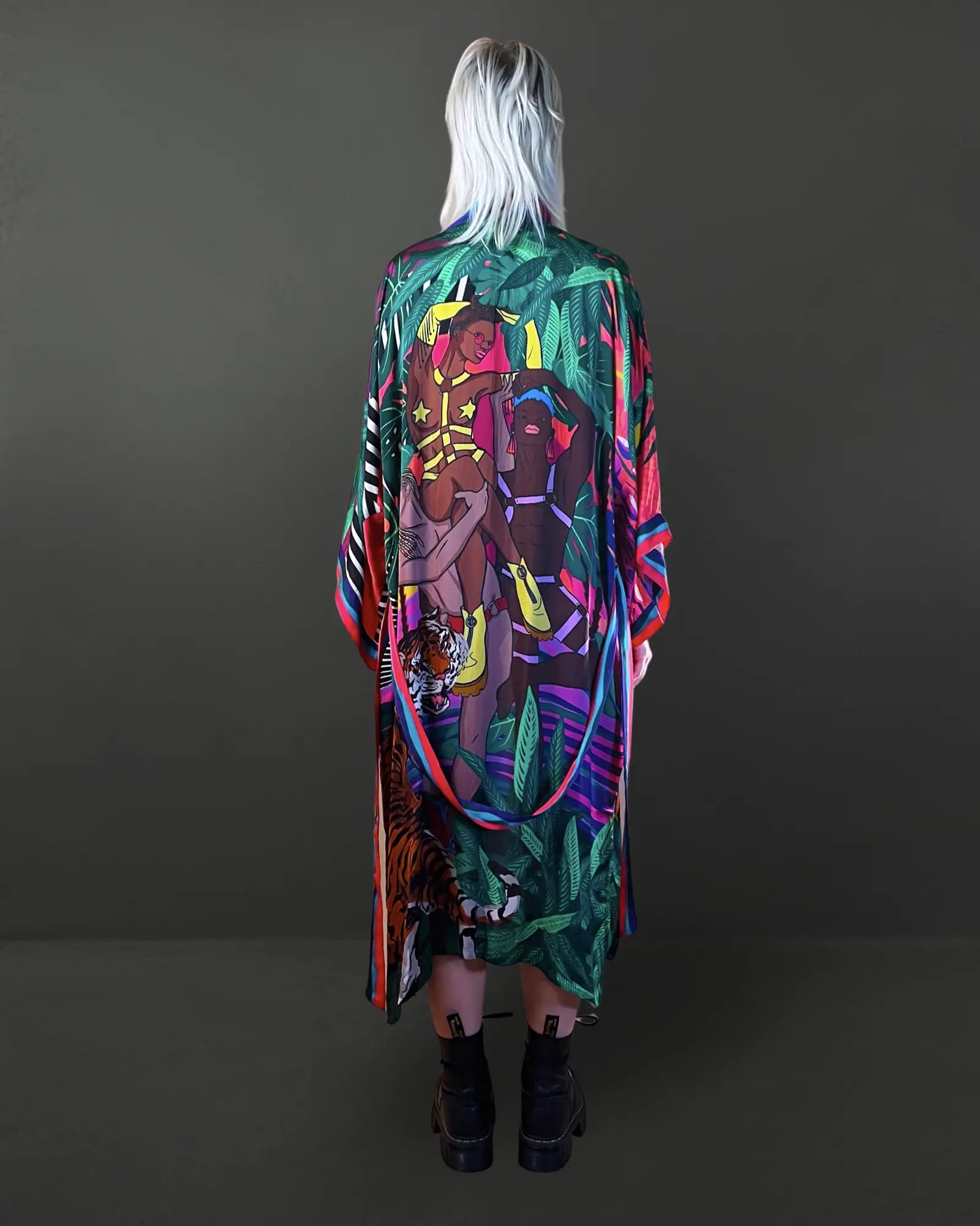 Back view showing flowing Cupro Bemberg fabric and printed tropical design