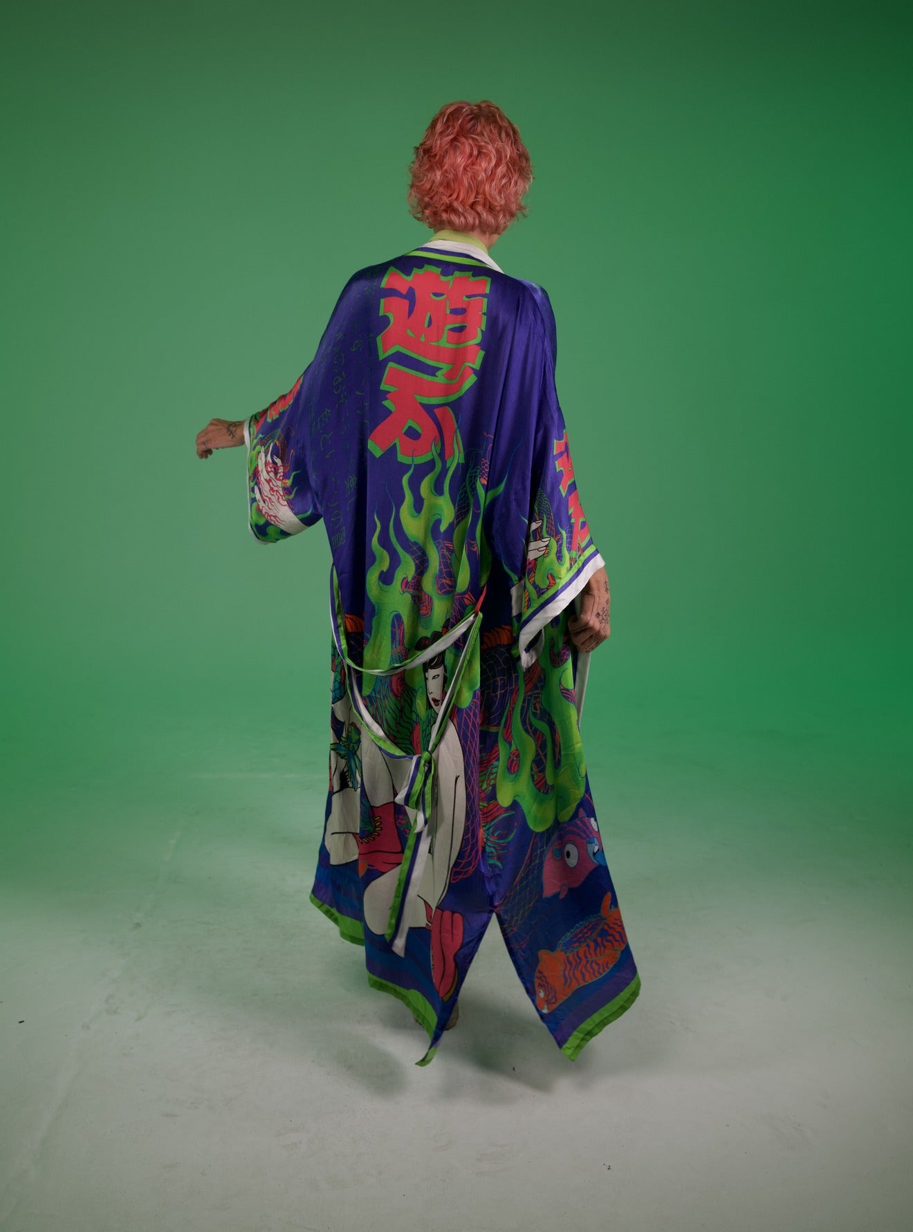 Back view showing kimono length and flowing silhouette